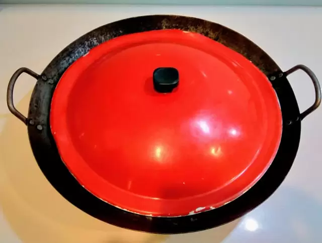 SS wok , used. With a lid